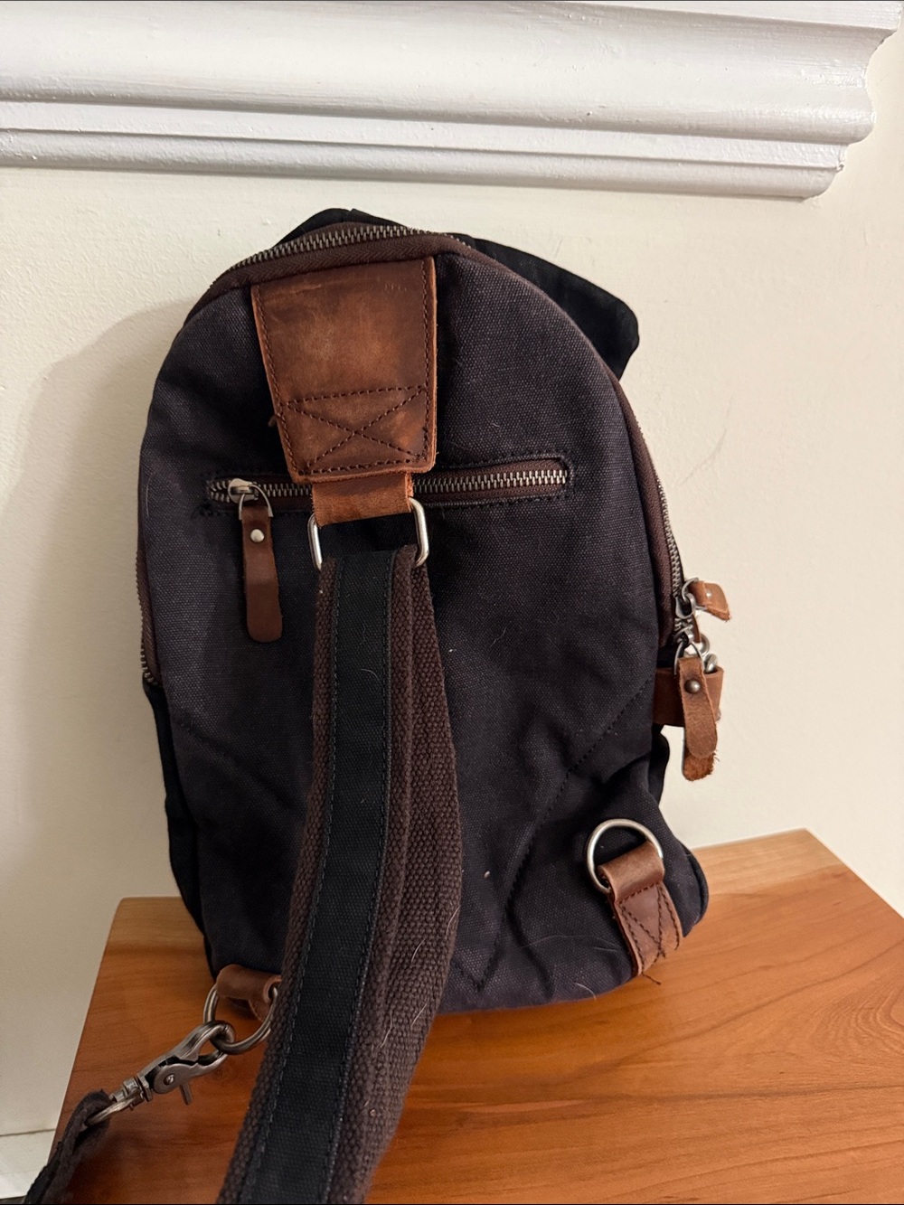 Black Canvas Sling Backpack with Leather Trim